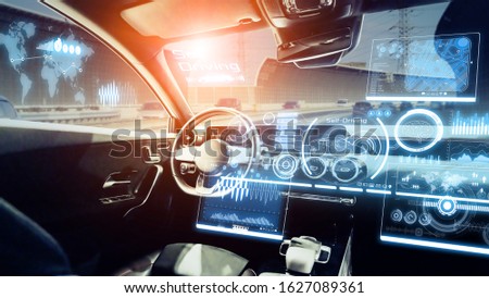 Interior of autonomous car. Driverless vehicle. Self driving. UGV. Advanced driver assistant system. Royalty-Free Stock Photo #1627089361