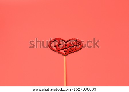Valentine's Day, Birthday, Mother's Day. Wooden sign with the inscription: I love you  on the middle on a pink background. Holiday background