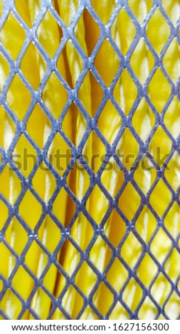 Photo of an air filter with a metal mesh. As background or pattern