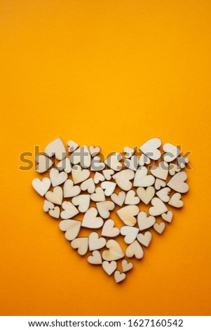 Valentines day background with wooden hearts 