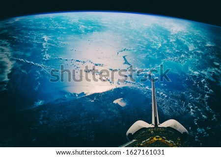 Blue earth, shot in distance. The elements of this image furnished by NASA.
