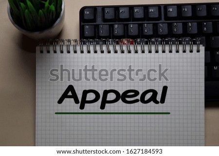 Appeal write on a book isolated on office desk.