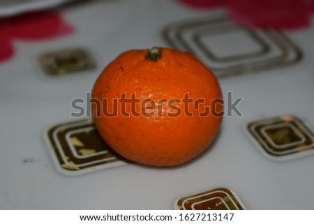 Macro photography of a Mandarin on the table