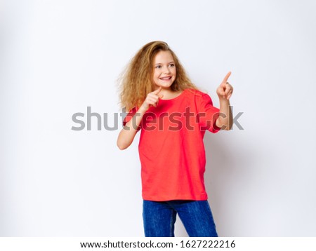 red shirt model emotional child beautiful girl curly hair white background