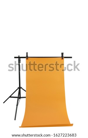 Portable background tripod holder isolated on white background. aluminum stand holder with yellow photo background
