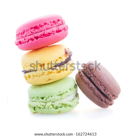 tower of french macaroons isolated on white background