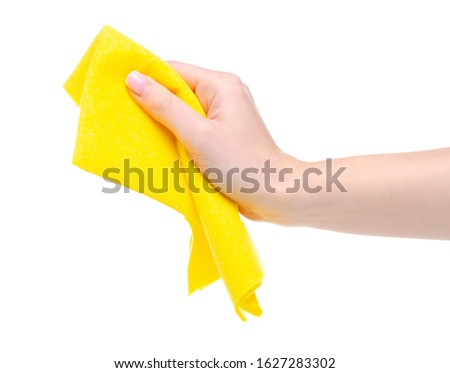 Yellow rag cleaning in hand on white background isolation Royalty-Free Stock Photo #1627283302
