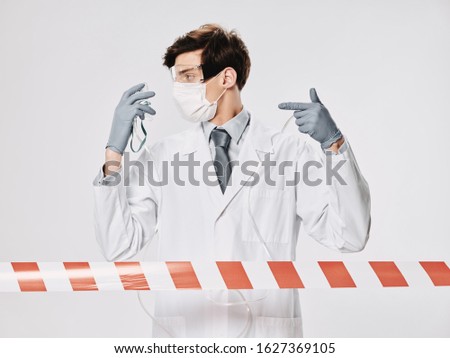 Male doctor white coat weasel virus epidemic safety research health