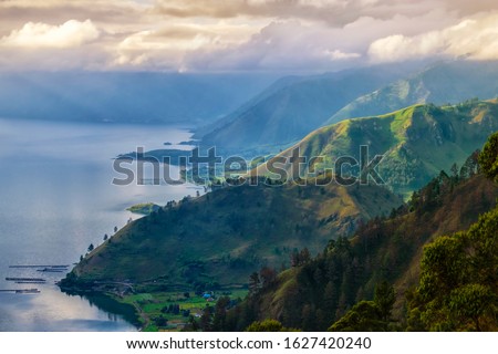 Lake Toba (Danau Toba), one of the biggest volcano lake in the world with the mountain landscape in North Sumatera , Indonesia Royalty-Free Stock Photo #1627420240