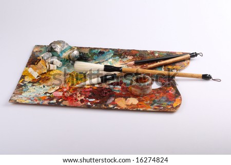 Palette and brushes of the artist
