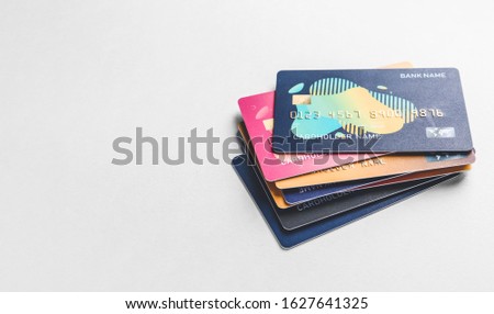 Different credit cards on light background