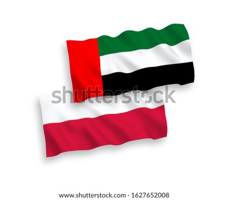 National vector fabric wave flags of United Arab Emirates and Poland isolated on white background. 1 to 2 proportion.