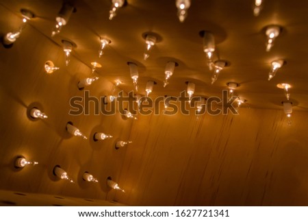 Abstract Background of White Christmas Lights in Wooden Box