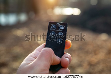 Remote control camera for remote shooting outdoors.
