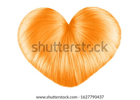 Blond hair in shape of heart on white, isolated. Doughnut bun