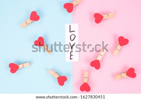 Find your love concept. Saint st holiday valentine day. Top above view photo of love writing card postcard for best holiday small clothes pins with vivid hearts