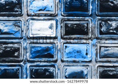 Closeup background texture of messy, used classic blue tones watercolor paintbox. Creative background. Paintings art hobby. Classic blue color of the year 2020 concept. Top view. Copy space.