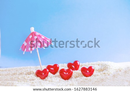 red Heart shape on white sand beach ,Image for love valentine day or summer vacation concept