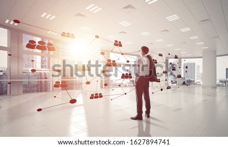 Elegant businessman in 3D office interior and social connection concept. Mixed media