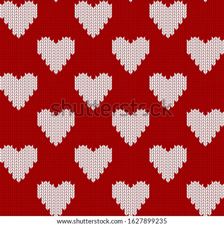 Knitted seamless pattern with hearts. Red background for valentines day