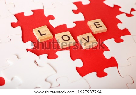 Greeting card for Valentine's Day. Heart from puzzles as a symbol of love. Lovers like puzzles complementing each other. I love you