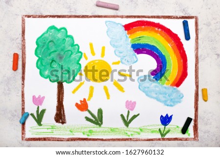 Photo of colorful drawing: Idyllic summer landscape. Rainbow, meadow with tree and colorful flowers. 