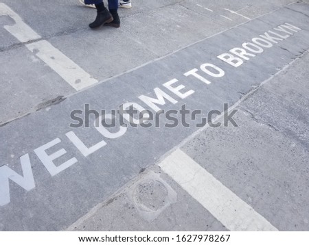 Welcome to Brooklyn Signage on the bridge sidewalk
