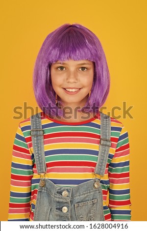 Anime fan. Cosplay kids party. Child cute cosplayer. Cosplay outfit. Otaku girl in wig smiling on yellow background. Cosplay character concept. Culture hobby and entertainment. Happy childhood.