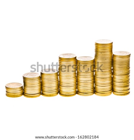 Columns of golden coins isolated on white background