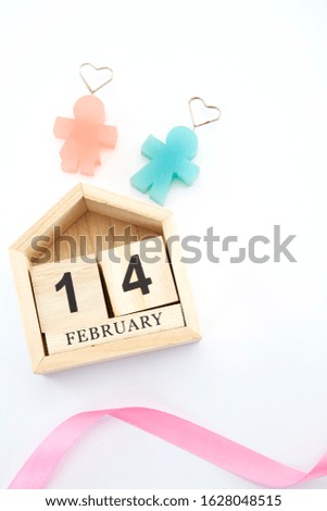 14 of February on wooden calendar on the white background. Happy Valentines Day, Greeting card. Top view, flat lay. Love concept