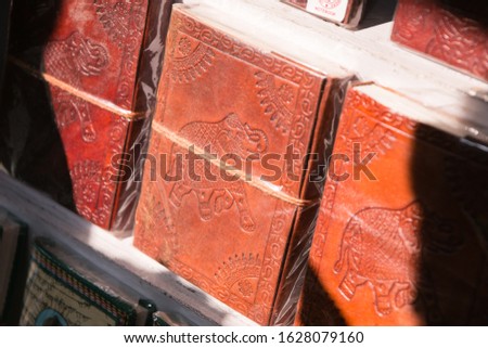 Handmade leather notebook on the newsstand