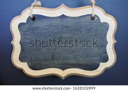 Wooden frame of a empty chalkboard sign with copy text space. No people. Copy space