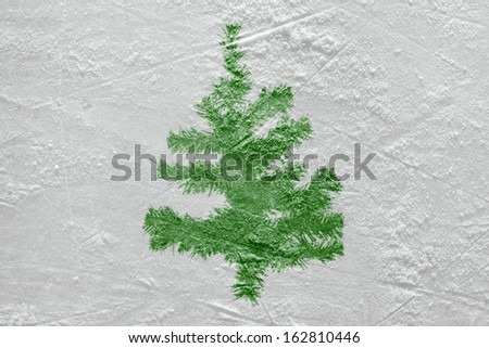 Image of Christmas trees on the surface of the ice surface. Texture, background