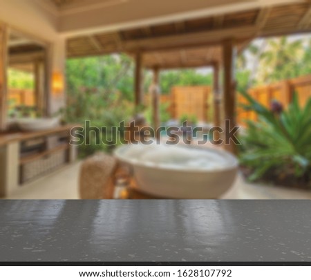 Table Top And Blur Bathroom Of The Background
