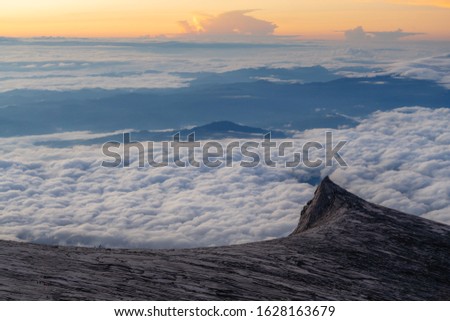 Sunrise landscape over horizon and clouds at Kota Kinabalu's summit in Malaysia