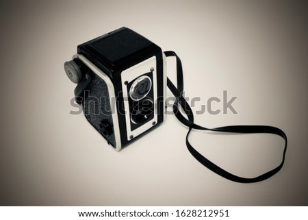 Old style film camera with a fixed aperture