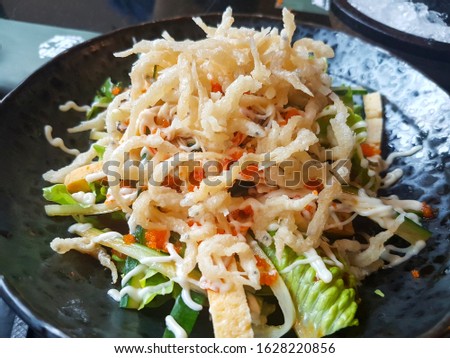 Shirauo Salad, Crispy deep fried small fish salad. Royalty-Free Stock Photo #1628220856