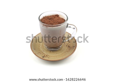 Chocolate milk on a white background. Inside the glass cup. Isolated shooting. Studio shoot. Shooting at eye level.