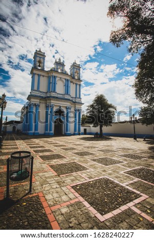 Church painted in blue and white in the city of San Cristobal de Las Casas, Mexico.
