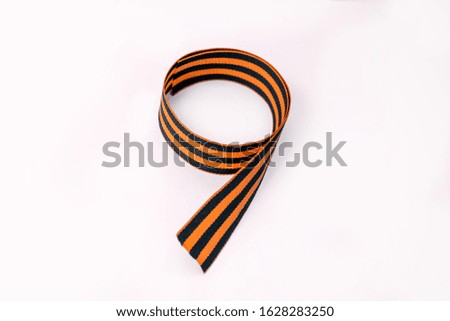 MAY 9. VICTORY DAY. St. George ribbon in the form of 9. Isolated. Victory, memory, veterans concept.