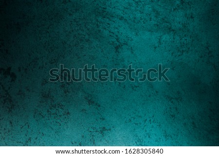 Vintage turquoise texture for design background. Bright backdrop. Art plaster. Illuminated surface. Abstract image. Bitmap image.