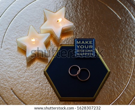Wedding rings in a romantic setting