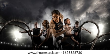 Sport collage. Men and woman running on smoke background. Sports banner. Horizontal copy space background Royalty-Free Stock Photo #1628328730