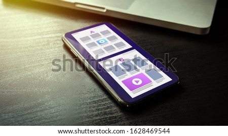 A B split testing concept - comparison with randomized experiments. Smartphone with two A-B webpages with a different web development UI interface on the screen Royalty-Free Stock Photo #1628469544