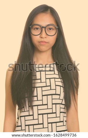 Close up of young Asian teenage nerd girl