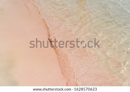 Pink beach with transparent waters in Greece. Elafonissi beach, Crete Greece