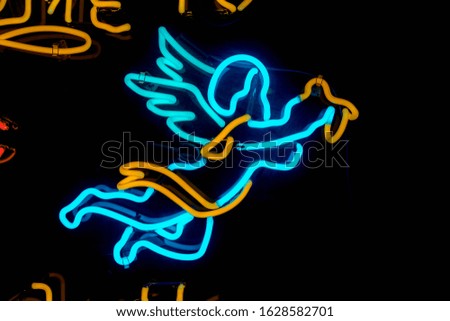 blue angel neon sign holy concept marriage