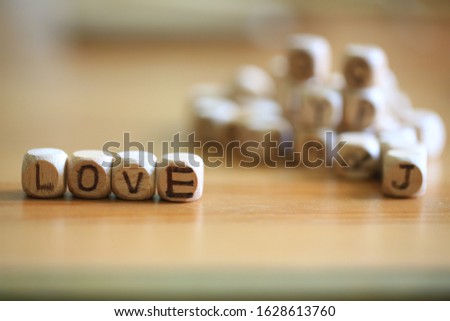 put the alphanet cubes into the word love