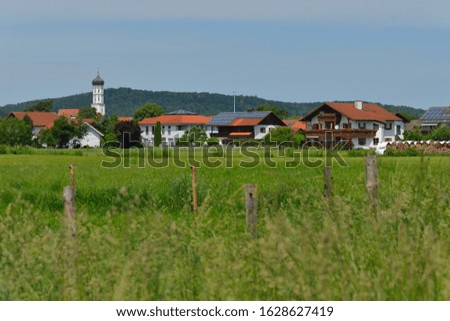 View to village raisting in bavaria