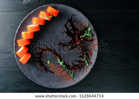 Real sushi set. China New Year style. Idea for cafe, restaurant, bar, advertising, poster, postcards. sushi shaped dragon menu for chinese new year. Top view, flat lay